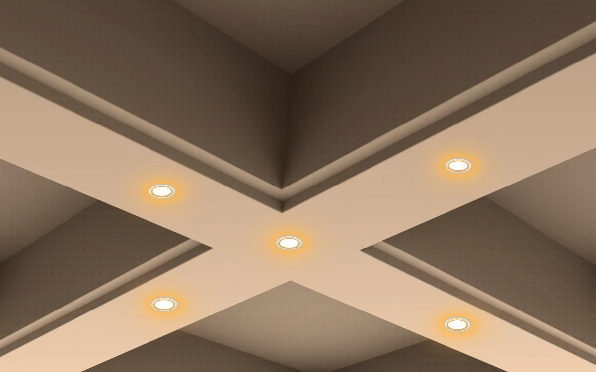 Intersection de poutres à caissons IB-11 en plâtre blanc avec spots encastrés chauds centrés