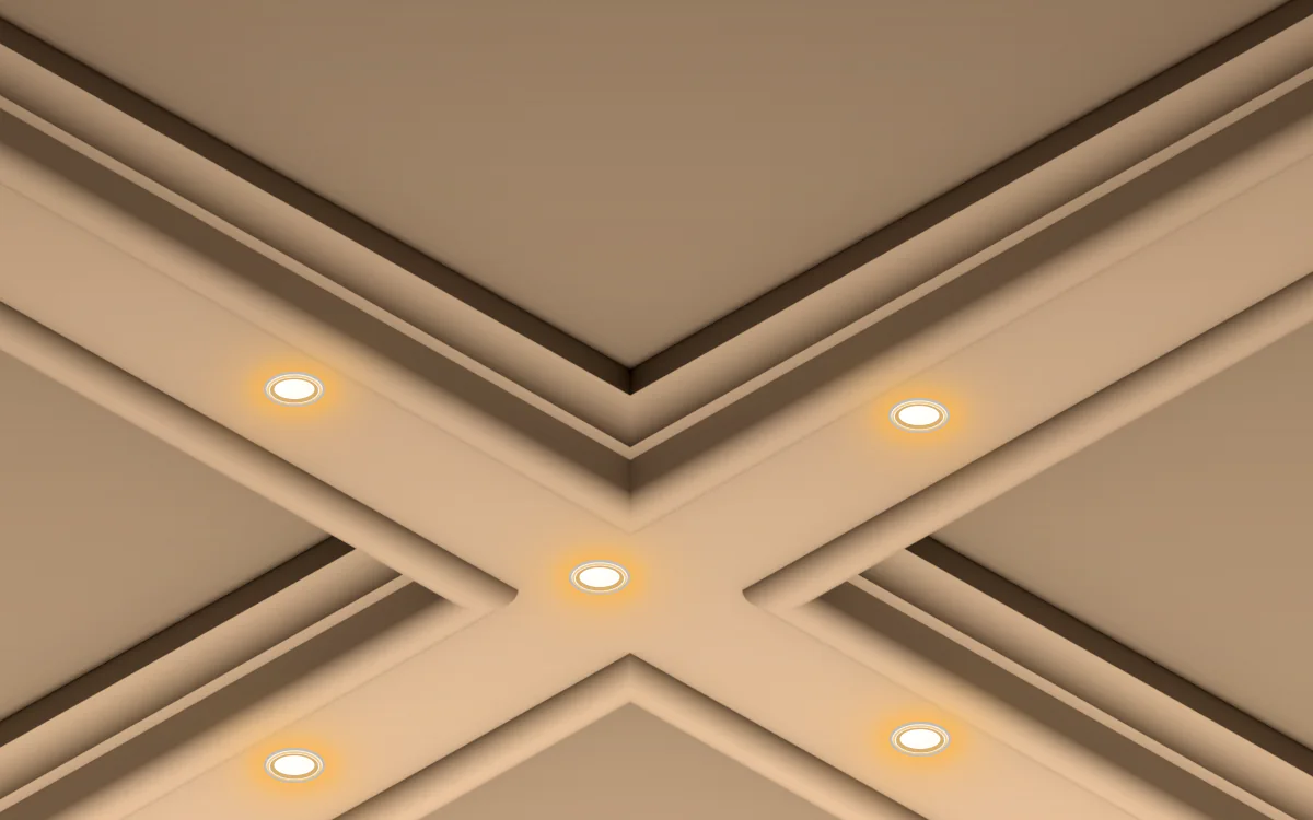 Intersection de poutres à caissons IN-16 en plâtre blanc avec spots encastrés chauds centrés
